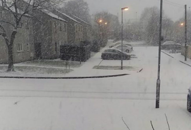 If you’re currently inside – stay there: it’s officially SNOWING!