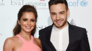Pregnant Cheryl cradles baby bump in stunning new photo shoot