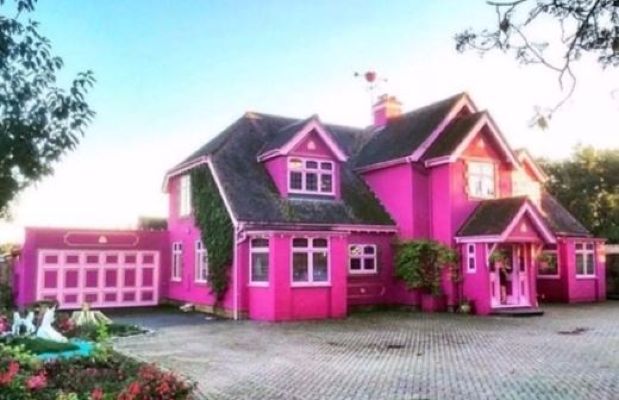 The public is absolutely OBSESSED with this bright pink Airbnb listing