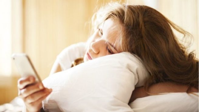Experts say sleeping by your phone may cause cancer or infertility