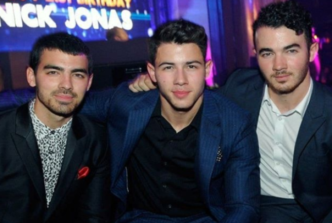 The Jonas Brothers are releasing a brand new single at MIDNIGHT
