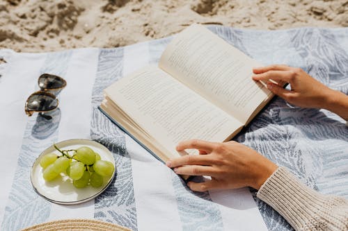 7 thoughtful and entertaining books to crack open on the beach before summer ends