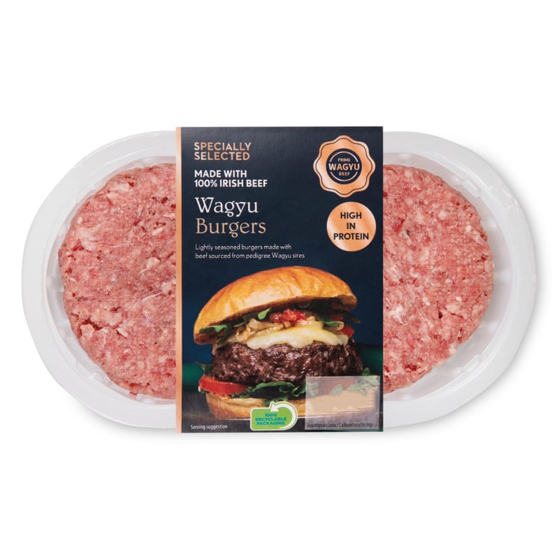 Specially Selected Wagyu Burgers pack of two raw beef patties in clear tray with navy label, 340g.