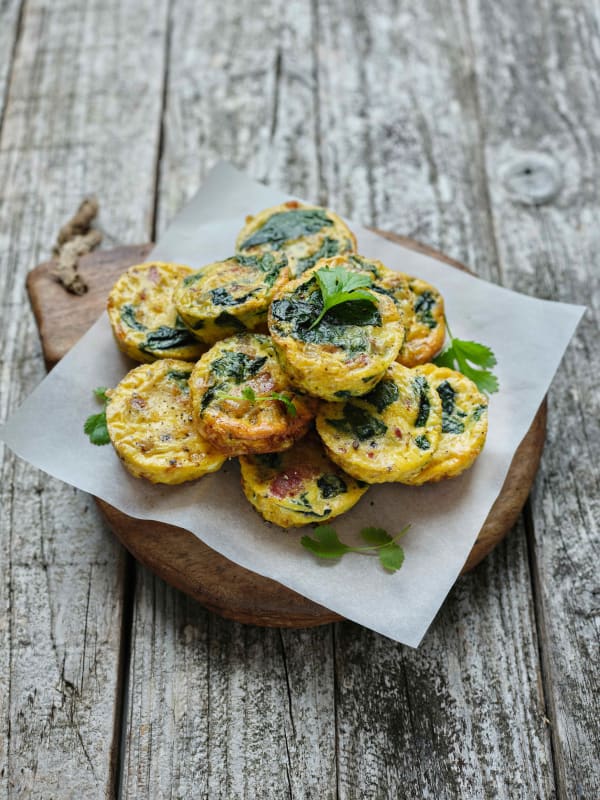 Mini frittatas with bacon and spinach.